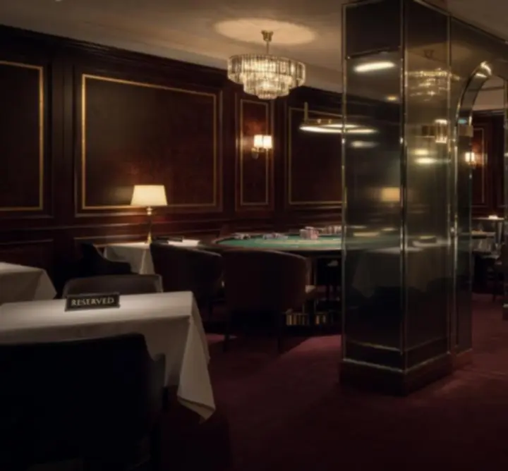 Hangulatos, sötét tónusú VIP lounge kaszinó és fine dining asztalokkal